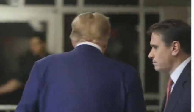 Trump walks away from reporters when asked if he wants to testify